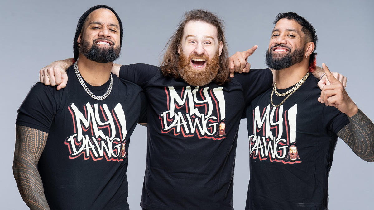 WWE star Sami Zayn with The Usos.