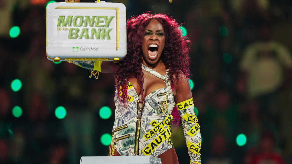 WWE star Naomi with Money in the Bank briefcase