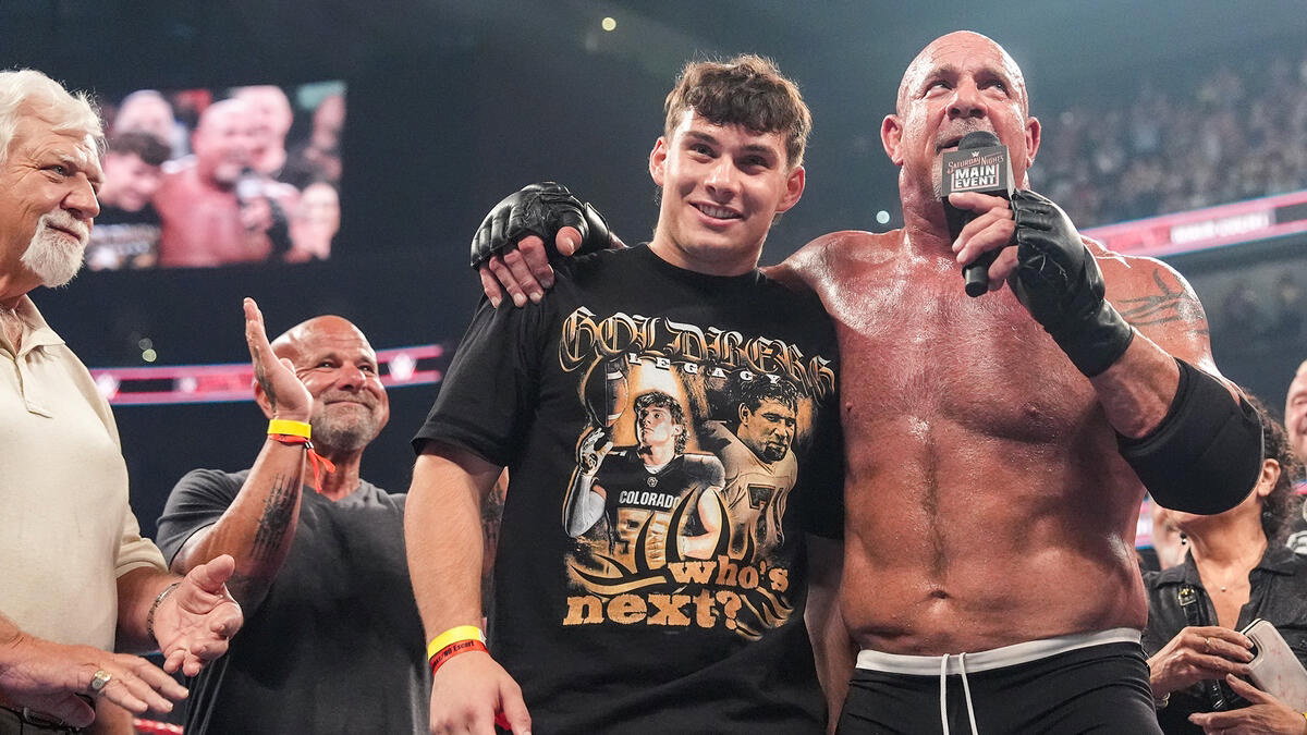Goldberg with Gage Goldberg at WWE Saturday Night's Main Event