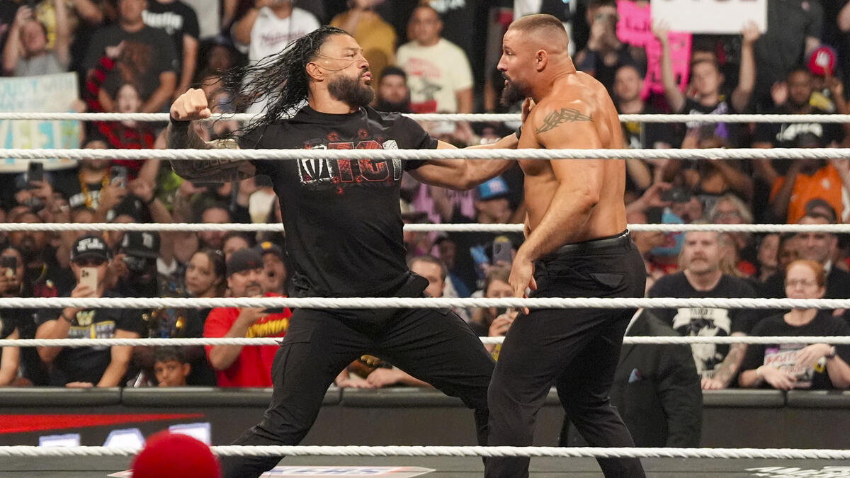 Roman Reigns fighting Bron Breakker at WWE Raw