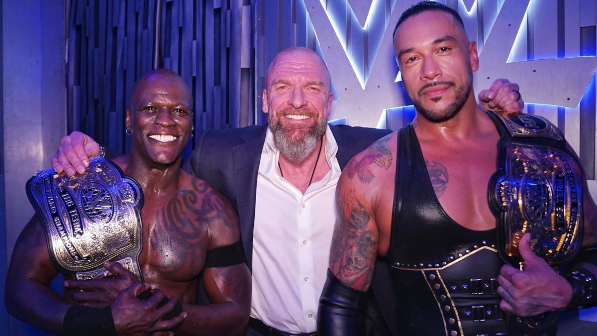 WWE Tag Team Champions Damian Priest and R-Truth with Triple H