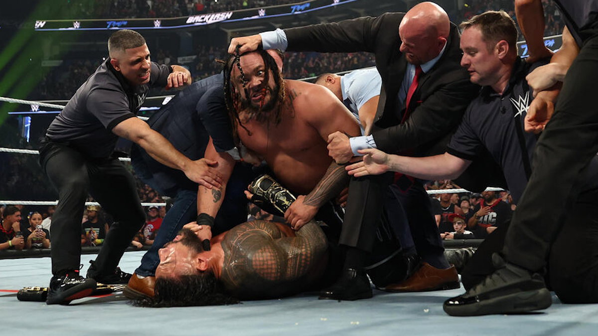 Jacob Fatu hitting the Tongan Death Grip on Roman Reigns at WWE Backlash 2026