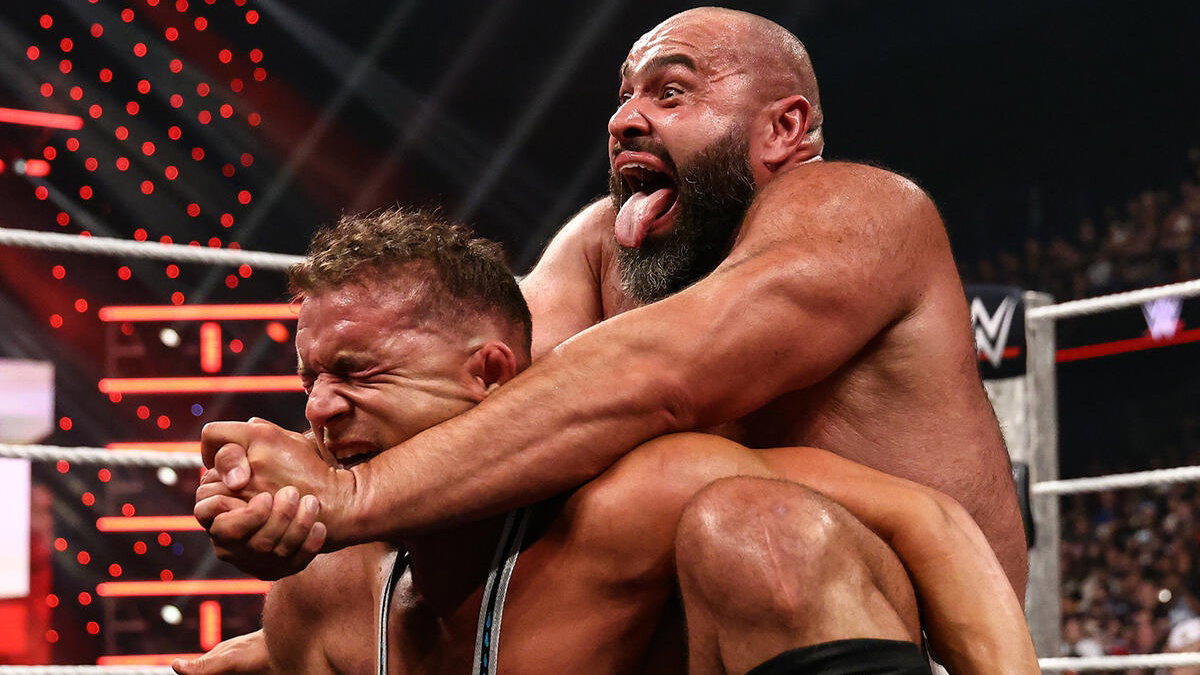 WWE's Rusev hitting The Accolade on Chad Gable.